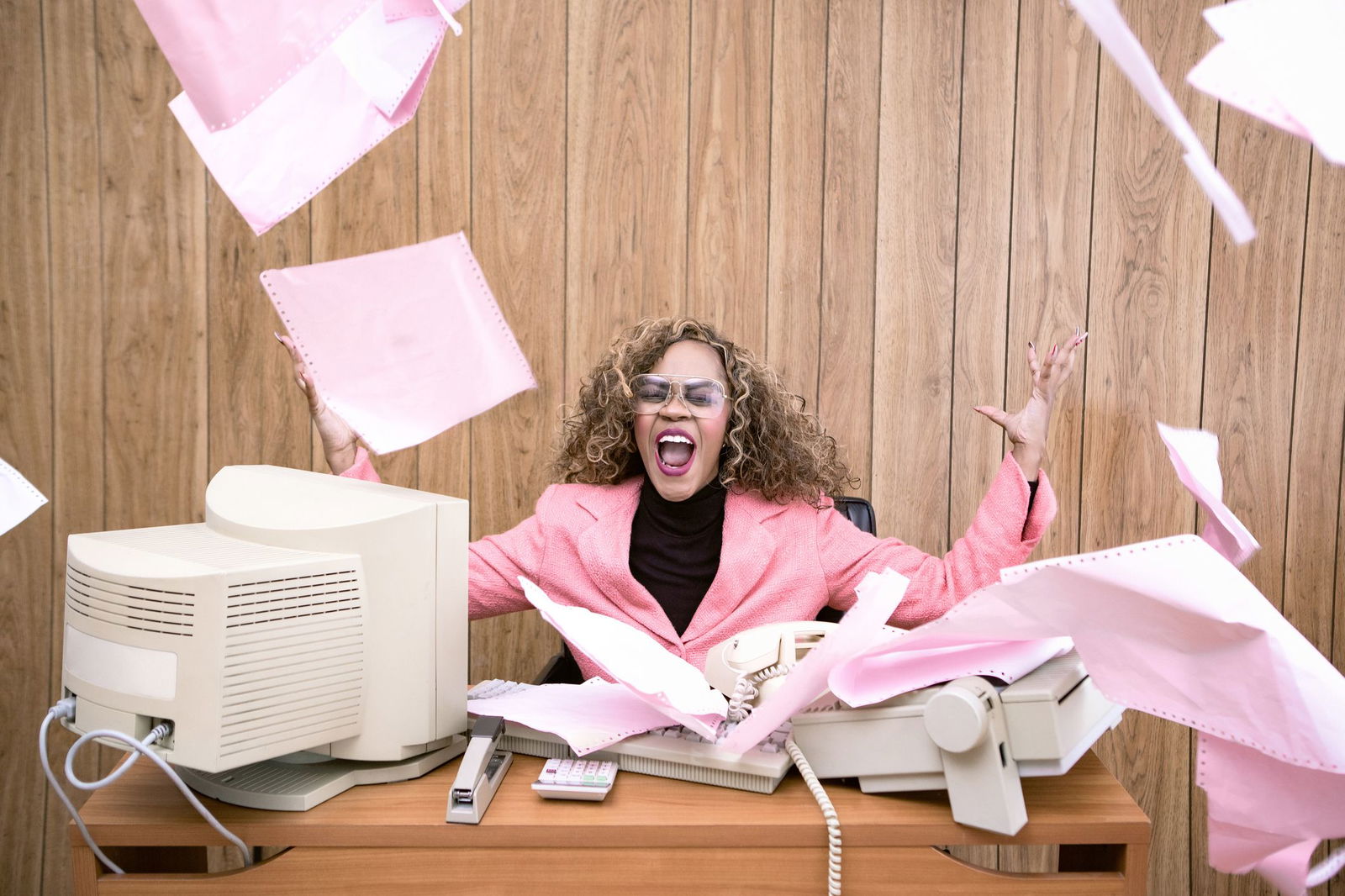 Angry-Retro-Secretary-At-Computer-Desk-In-Office-1301825953_2125x1416.jpeg